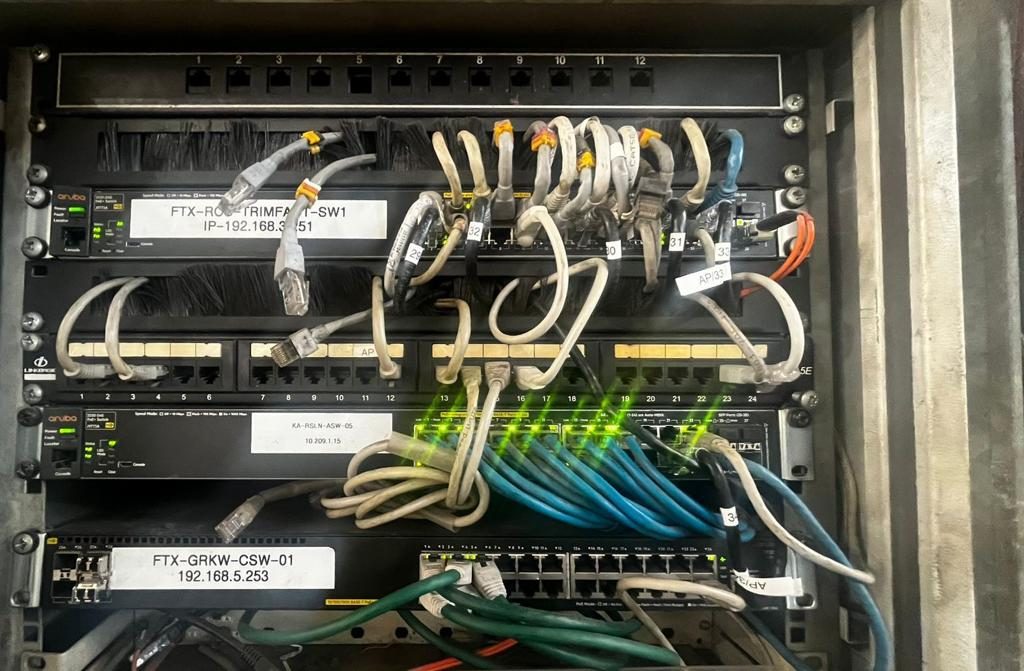 Network cabinet before cleanup